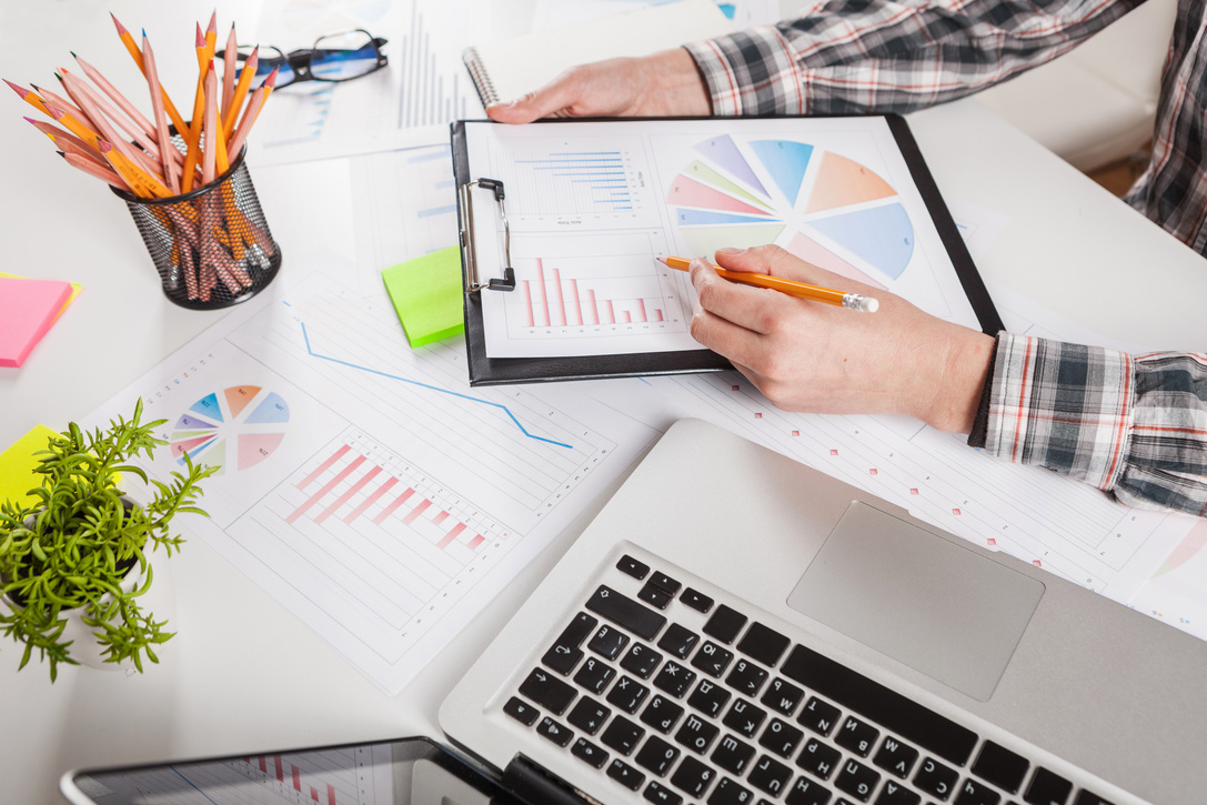 Businessman Working on Data Charts